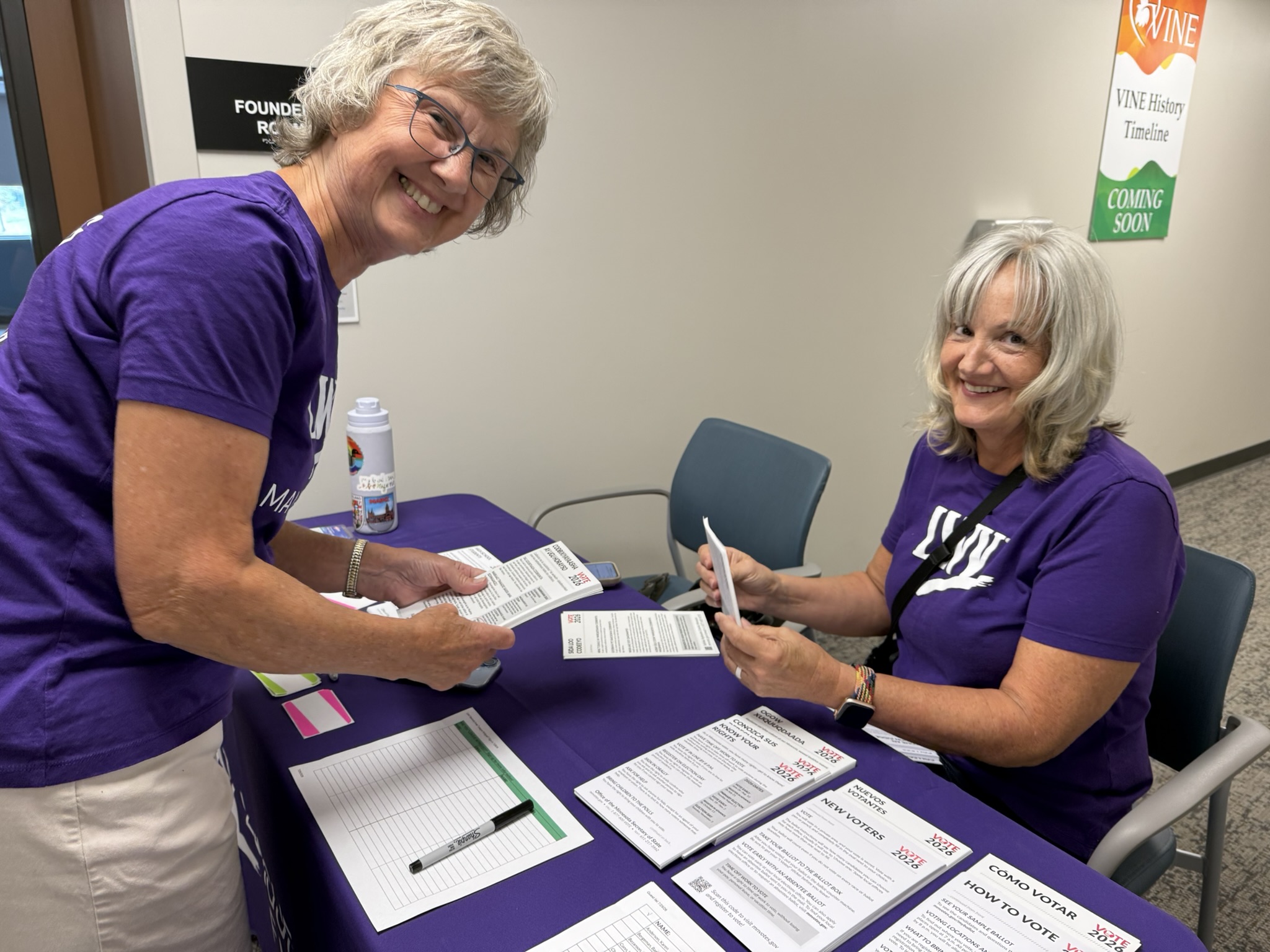 Two League of Women Voters Mankato Area volunteers doing checkins for Voter 101 training